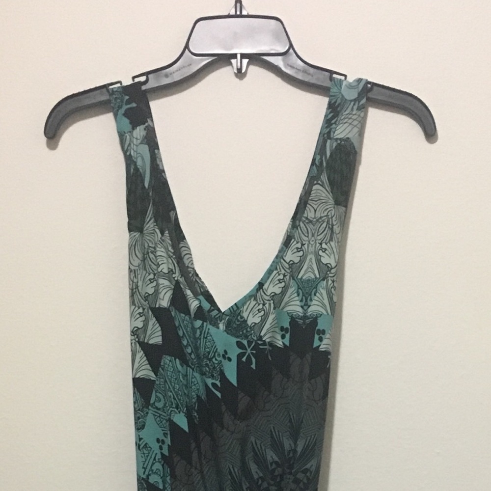 Super cute jumpsuit with cutout back!